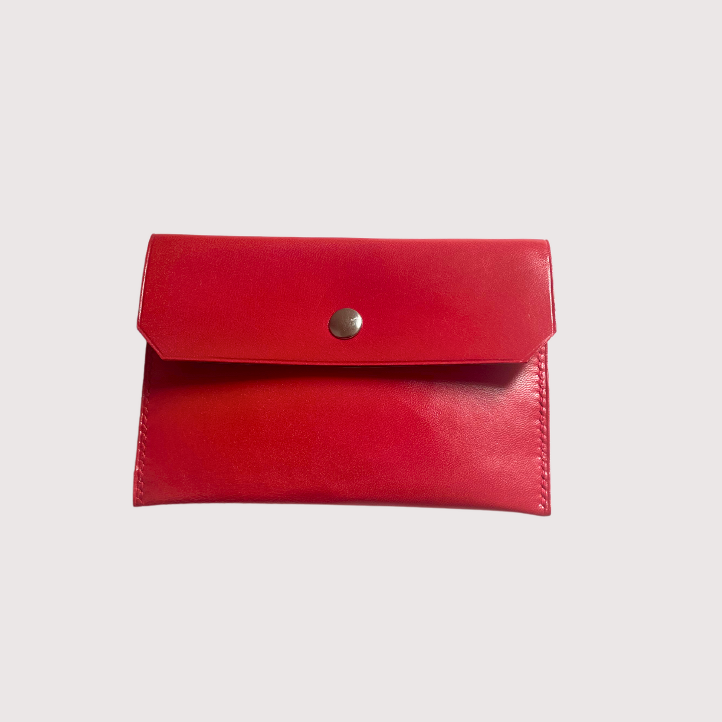 Bene reddish orange pouch